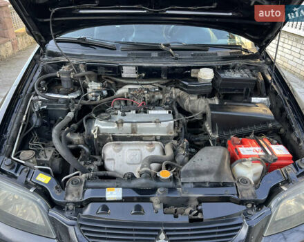 Чорний Міцубісі Спейс Стар, об'ємом двигуна 1.6 л та пробігом 300 тис. км за 2750 $, фото 47 на Automoto.ua