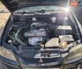Черный Мицубиси Спейс Стар, объемом двигателя 1.58 л и пробегом 300 тыс. км за 3000 $, фото 6 на Automoto.ua