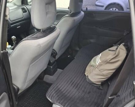 Черный Мицубиси Спейс Стар, объемом двигателя 1.58 л и пробегом 478 тыс. км за 2600 $, фото 3 на Automoto.ua