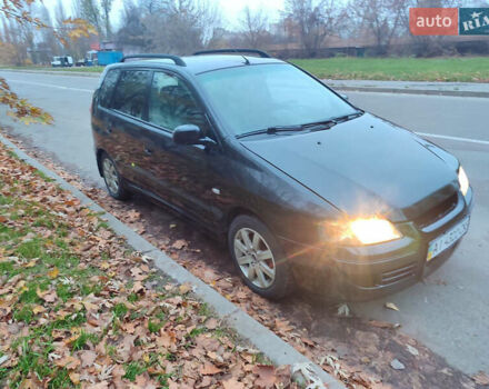 Черный Мицубиси Спейс Стар, объемом двигателя 1.9 л и пробегом 401 тыс. км за 3200 $, фото 1 на Automoto.ua