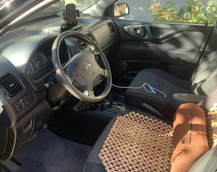 Міцубісі Спейс Стар 2004 у Одесі на Automoto.ua Чорний Міцубісі Спейс Стар, об'ємом двигуна 1.58 л та пробігом 242 тис. км за 3500 $, фото 12 на Automoto.ua