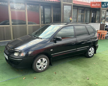 Черный Мицубиси Спейс Стар, объемом двигателя 1.83 л и пробегом 190 тыс. км за 2800 $, фото 4 на Automoto.ua