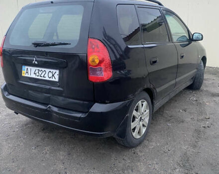 Черный Мицубиси Спейс Стар, объемом двигателя 0 л и пробегом 250 тыс. км за 2400 $, фото 4 на Automoto.ua