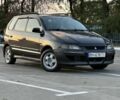 Черный Мицубиси Спейс Стар, объемом двигателя 1.6 л и пробегом 350 тыс. км за 2699 $, фото 1 на Automoto.ua