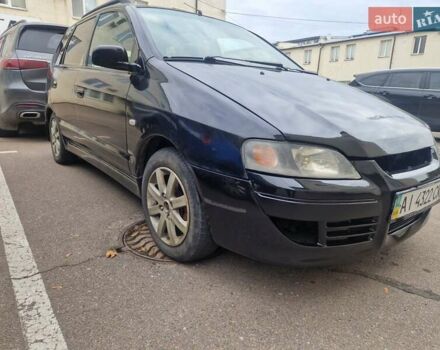 Чорний Міцубісі Спейс Стар, об'ємом двигуна 1.8 л та пробігом 250 тис. км за 1999 $, фото 2 на Automoto.ua
