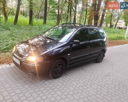 Черный Мицубиси Спейс Стар, объемом двигателя 1.58 л и пробегом 250 тыс. км за 2500 $, фото 1 на Automoto.ua