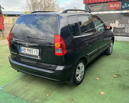 Черный Мицубиси Спейс Стар, объемом двигателя 1.83 л и пробегом 190 тыс. км за 2800 $, фото 1 на Automoto.ua