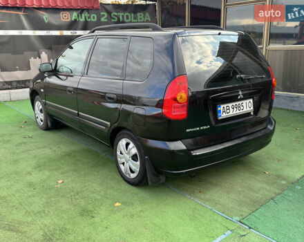 Черный Мицубиси Спейс Стар, объемом двигателя 1.83 л и пробегом 190 тыс. км за 2800 $, фото 2 на Automoto.ua