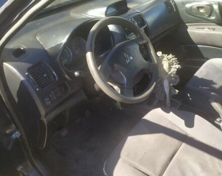 Черный Мицубиси Спейс Стар, объемом двигателя 1.58 л и пробегом 196 тыс. км за 2650 $, фото 4 на Automoto.ua