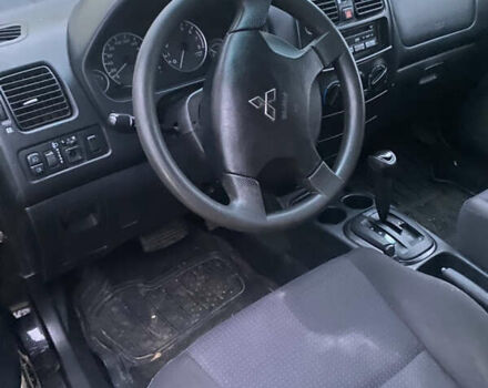 Черный Мицубиси Спейс Стар, объемом двигателя 0 л и пробегом 250 тыс. км за 2700 $, фото 6 на Automoto.ua