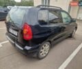 Черный Мицубиси Спейс Стар, объемом двигателя 1.8 л и пробегом 250 тыс. км за 1900 $, фото 3 на Automoto.ua