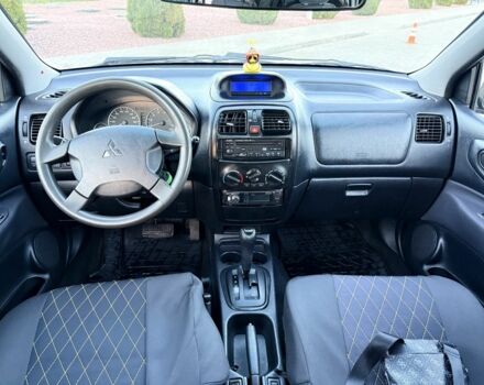 Черный Мицубиси Спейс Стар, объемом двигателя 1.8 л и пробегом 190 тыс. км за 3250 $, фото 5 на Automoto.ua