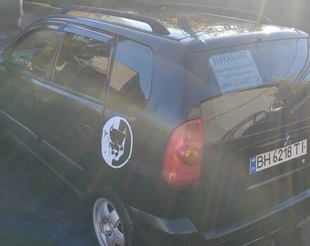 Черный Мицубиси Спейс Стар, объемом двигателя 1.6 л и пробегом 360 тыс. км за 2800 $, фото 2 на Automoto.ua