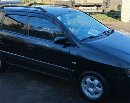 Черный Мицубиси Спейс Стар, объемом двигателя 1.6 л и пробегом 360 тыс. км за 2800 $, фото 1 на Automoto.ua