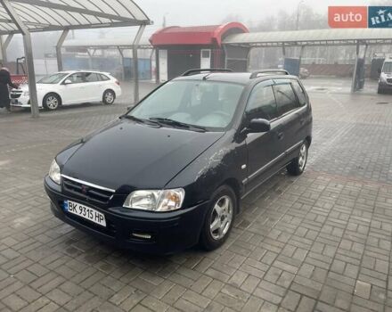 Черный Мицубиси Спейс Стар, объемом двигателя 1.3 л и пробегом 300 тыс. км за 2500 $, фото 1 на Automoto.ua