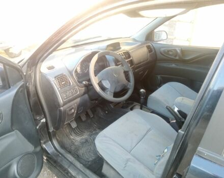 Черный Мицубиси Спейс Стар, объемом двигателя 1 л и пробегом 356 тыс. км за 2000 $, фото 1 на Automoto.ua