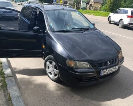 Черный Мицубиси Спейс Стар, объемом двигателя 1.6 л и пробегом 210 тыс. км за 2000 $, фото 1 на Automoto.ua