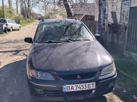 Мицубиси Спейс Стар 2003 в Новомиргороде на Automoto.ua Черный Мицубиси Спейс Стар, объемом двигателя 1.58 л и пробегом 300 тыс. км за 3400 $, фото 1 на Automoto.ua