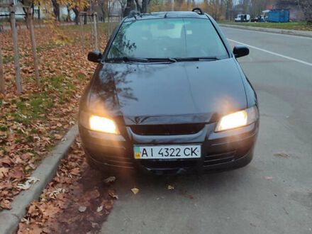 Черный Мицубиси Спейс Стар, объемом двигателя 1.9 л и пробегом 401 тыс. км за 3200 $, фото 1 на Automoto.ua