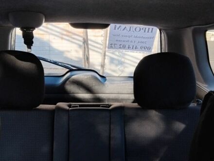 Черный Мицубиси Спейс Стар, объемом двигателя 1.6 л и пробегом 360 тыс. км за 2800 $, фото 1 на Automoto.ua