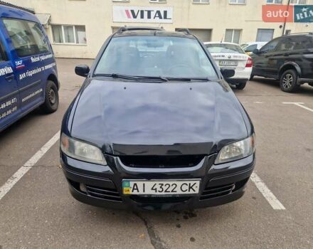 Черный Мицубиси Спейс Стар, объемом двигателя 1.8 л и пробегом 250 тыс. км за 1999 $, фото 1 на Automoto.ua