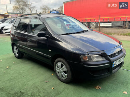 Черный Мицубиси Спейс Стар, объемом двигателя 1.83 л и пробегом 190 тыс. км за 2800 $, фото 1 на Automoto.ua