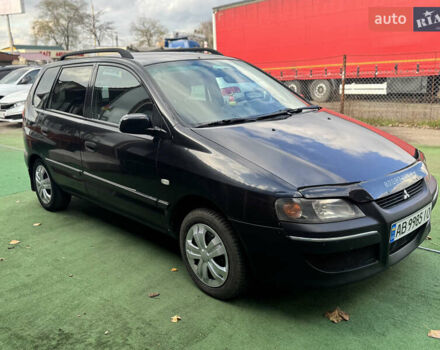 Черный Мицубиси Спейс Стар, объемом двигателя 1.83 л и пробегом 190 тыс. км за 2800 $, фото 1 на Automoto.ua