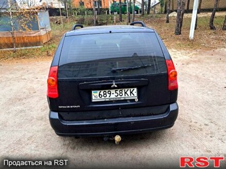 Міцубісі Спейс Стар 2004 у Києві на Automoto.ua Чорний Міцубісі Спейс Стар, об'ємом двигуна 16 л та пробігом 330 тис. км за 3400 $, фото 1 на Automoto.ua