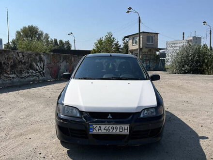 Міцубісі Спейс Стар 2004 у Києві на Automoto.ua Чорний Міцубісі Спейс Стар, об'ємом двигуна 1.6 л та пробігом 275 тис. км за 3500 $, фото 1 на Automoto.ua