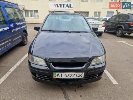 Міцубісі Спейс Стар 2004 у Києві на Automoto.ua Чорний Міцубісі Спейс Стар, об'ємом двигуна 1.8 л та пробігом 250 тис. км за 2000 $, фото 1 на Automoto.ua