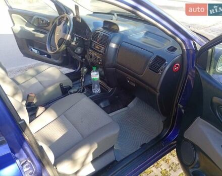 Фиолетовый Мицубиси Спейс Стар, объемом двигателя 1.58 л и пробегом 240 тыс. км за 3500 $, фото 4 на Automoto.ua