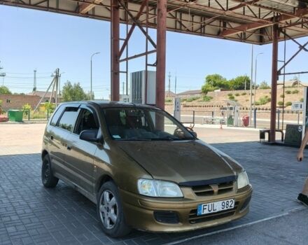 Коричневий Міцубісі Спейс Стар, об'ємом двигуна 2 л та пробігом 285 тис. км за 1499 $, фото 1 на Automoto.ua