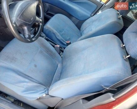 Червоний Міцубісі Спейс Стар, об'ємом двигуна 1.3 л та пробігом 333 тис. км за 2300 $, фото 9 на Automoto.ua