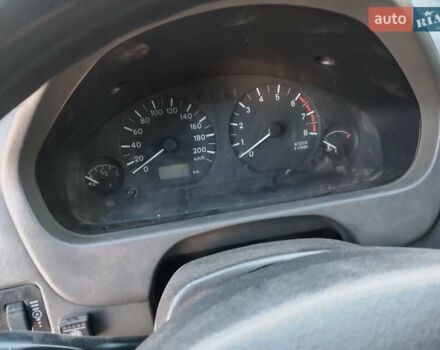Червоний Міцубісі Спейс Стар, об'ємом двигуна 1.3 л та пробігом 333 тис. км за 2300 $, фото 10 на Automoto.ua