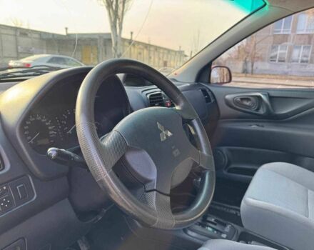 Мицубиси Спейс Стар 2002 в Днепре (Днепропетровске) на Automoto.ua Красный Мицубиси Спейс Стар, объемом двигателя 1.6 л и пробегом 177 тыс. км за 5200 $, фото 17 на Automoto.ua