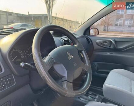 Красный Мицубиси Спейс Стар, объемом двигателя 1.59 л и пробегом 177 тыс. км за 5200 $, фото 17 на Automoto.ua