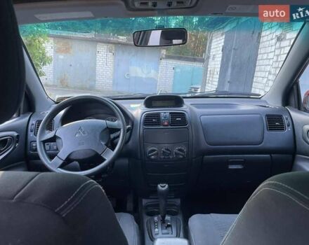Мицубиси Спейс Стар 2003 в Киеве на Automoto.ua Красный Мицубиси Спейс Стар, объемом двигателя 1.6 л и пробегом 220 тыс. км за 4000 $, фото 34 на Automoto.ua