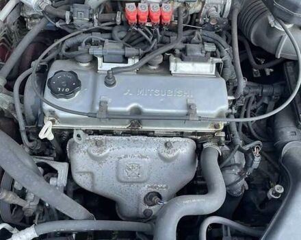 Мицубиси Спейс Стар 2003 в Киеве на Automoto.ua Красный Мицубиси Спейс Стар, объемом двигателя 1.6 л и пробегом 220 тыс. км за 4000 $, фото 40 на Automoto.ua