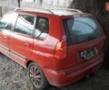 Красный Мицубиси Спейс Стар, объемом двигателя 1.9 л и пробегом 376 тыс. км за 3300 $, фото 1 на Automoto.ua