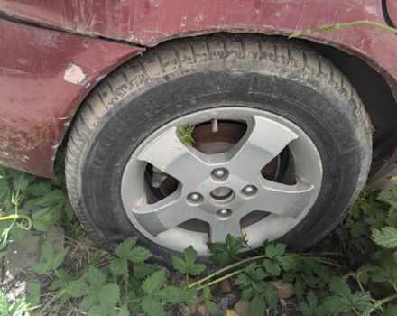 Красный Мицубиси Спейс Стар, объемом двигателя 1.6 л и пробегом 300 тыс. км за 1000 $, фото 7 на Automoto.ua