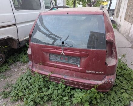 Красный Мицубиси Спейс Стар, объемом двигателя 1.6 л и пробегом 300 тыс. км за 1000 $, фото 2 на Automoto.ua