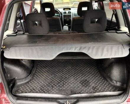 Красный Мицубиси Спейс Стар, объемом двигателя 1.83 л и пробегом 295 тыс. км за 3500 $, фото 11 на Automoto.ua