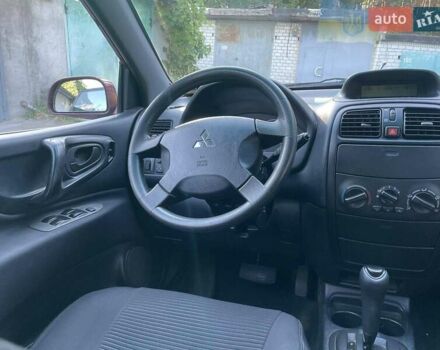 Мицубиси Спейс Стар 2003 в Киеве на Automoto.ua Красный Мицубиси Спейс Стар, объемом двигателя 1.6 л и пробегом 220 тыс. км за 4000 $, фото 25 на Automoto.ua