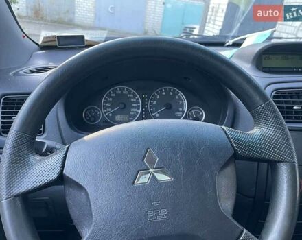 Мицубиси Спейс Стар 2003 в Киеве на Automoto.ua Красный Мицубиси Спейс Стар, объемом двигателя 1.6 л и пробегом 220 тыс. км за 4000 $, фото 33 на Automoto.ua