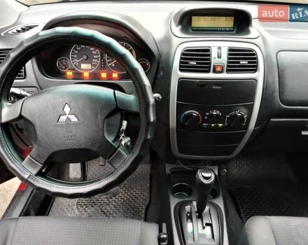 Красный Мицубиси Спейс Стар, объемом двигателя 1.83 л и пробегом 295 тыс. км за 3500 $, фото 8 на Automoto.ua