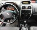 Красный Мицубиси Спейс Стар, объемом двигателя 1.83 л и пробегом 295 тыс. км за 3500 $, фото 8 на Automoto.ua