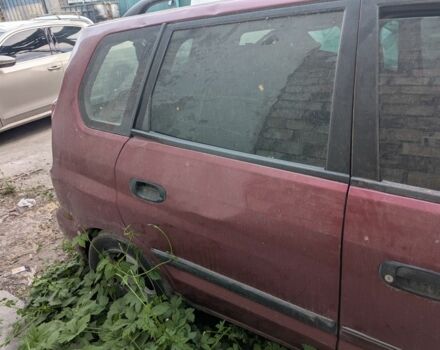 Красный Мицубиси Спейс Стар, объемом двигателя 1.6 л и пробегом 300 тыс. км за 1000 $, фото 3 на Automoto.ua