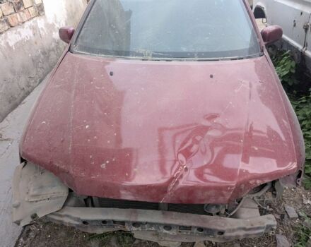 Красный Мицубиси Спейс Стар, объемом двигателя 1.6 л и пробегом 300 тыс. км за 1000 $, фото 5 на Automoto.ua