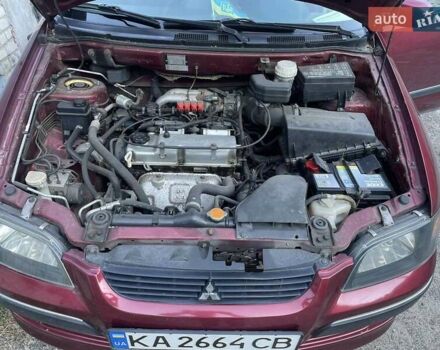 Мицубиси Спейс Стар 2003 в Киеве на Automoto.ua Красный Мицубиси Спейс Стар, объемом двигателя 1.6 л и пробегом 220 тыс. км за 4000 $, фото 43 на Automoto.ua