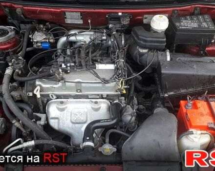 Красный Мицубиси Спейс Стар, объемом двигателя 1.6 л и пробегом 300 тыс. км за 4000 $, фото 12 на Automoto.ua